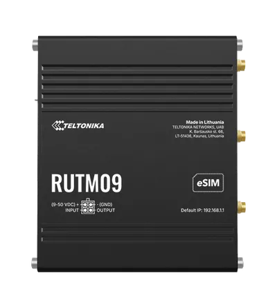 Router Teltonika RUTM09 LTE CAT6 con carcasa metálica negra, logo, modelo, etiqueta eSIM, conectores de antena dorados y Router Teltonika RUTM09 LTE CAT6 con carcasa metálica negra, logo, modelo, etiqueta eSIM, conectores de antena dorados y