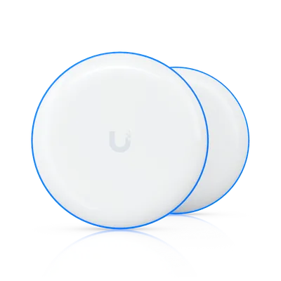 Puente UniFi Building Bridge 60 GHz Gigabit+ con dos dispositivos blancos circulares y anillo azul brillante sobre fondo Puente UniFi Building Bridge 60 GHz Gigabit+ con dos dispositivos blancos circulares y anillo azul brillante sobre fondo