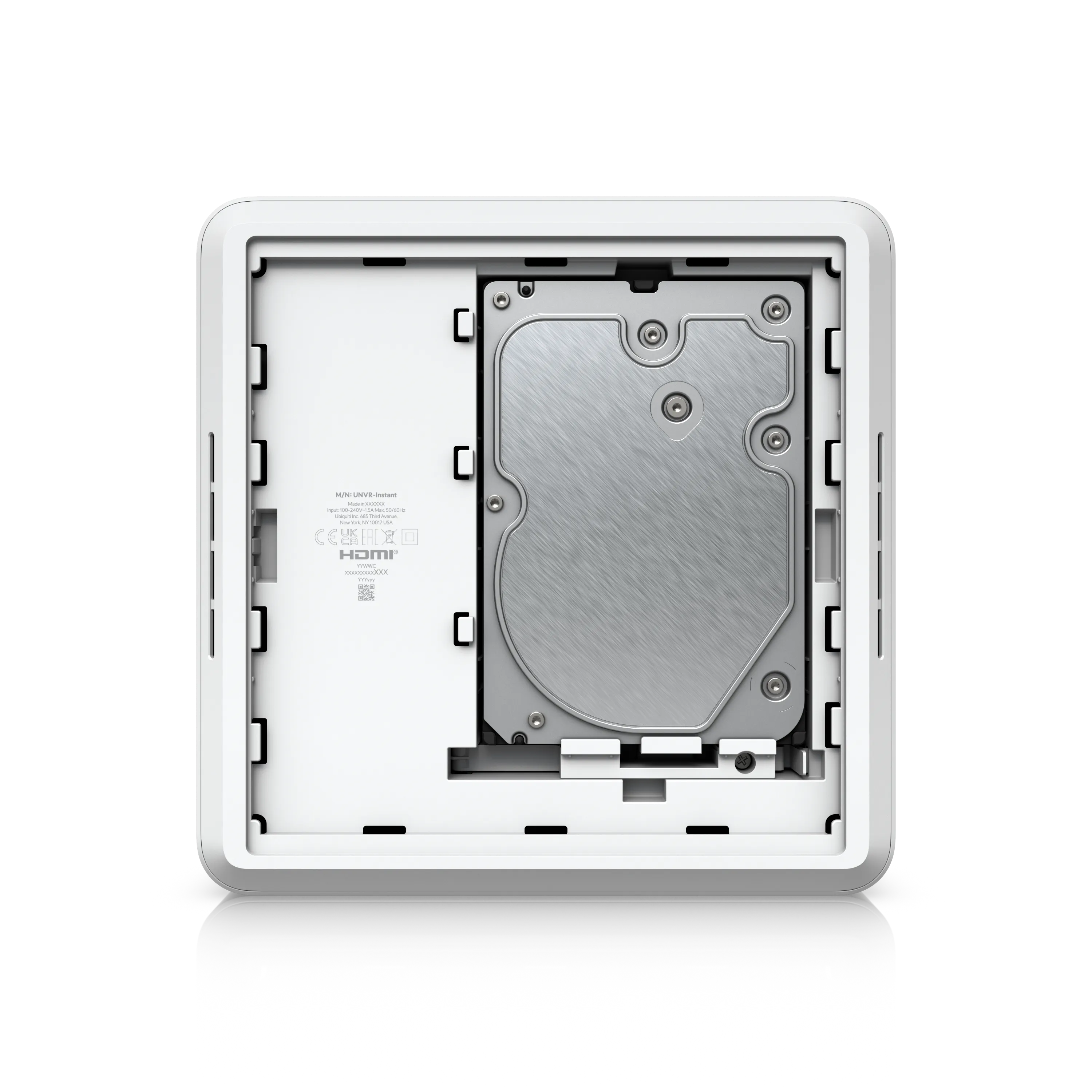 Ubiquiti UniFi UNVR-Instant Kit with front cover removed showing installed hard drive and interior panel with technical