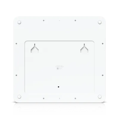Ubiquiti Access Hub Enterprise Grade Rückansicht mit Montageschlitzen, QR-Code und Gummifüßen für professionelle