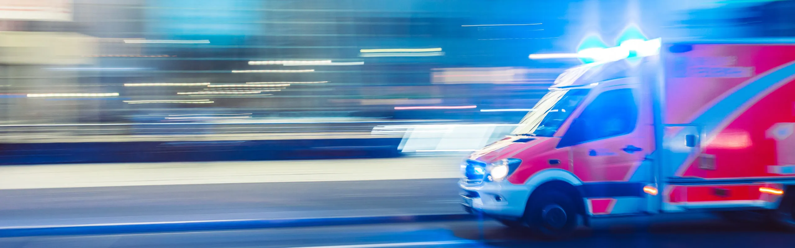 FIPS License for HD2 with MediaFast on ambulance emergency response system in high-speed urban transit with active lights.