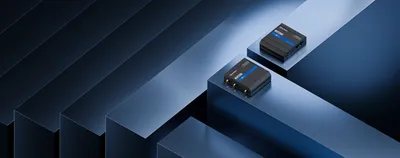 Компактный 4G/LTE роутер Teltonika RUT260 на синих подставках с синими акцентами и логотипом. Компактный 4G/LTE роутер Teltonika RUT260 на синих подставках с синими акцентами и логотипом.