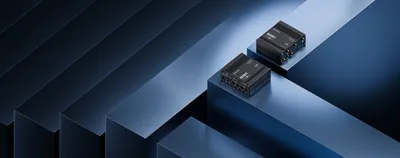 Teltonika RUTM11 LTE CAT6 WiFi router on display with dual black units showcasing front ports and ribbed metal casing on Teltonika RUTM11 LTE CAT6 WiFi router on display with dual black units showcasing front ports and ribbed metal casing on