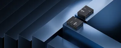 TELTONIKA RUTM59 5G router displayed on blue pedestals with cooling fins, ports, and antennas for industrial networking TELTONIKA RUTM59 5G router displayed on blue pedestals with cooling fins, ports, and antennas for industrial networking