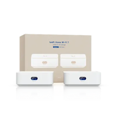 Consola UniFi Express 7 con dos dispositivos blancos y pantalla frontal junto a su caja de Wi-Fi 7 para cobertura de 350 m² Consola UniFi Express 7 con dos dispositivos blancos y pantalla frontal junto a su caja de Wi-Fi 7 para cobertura de 350 m²