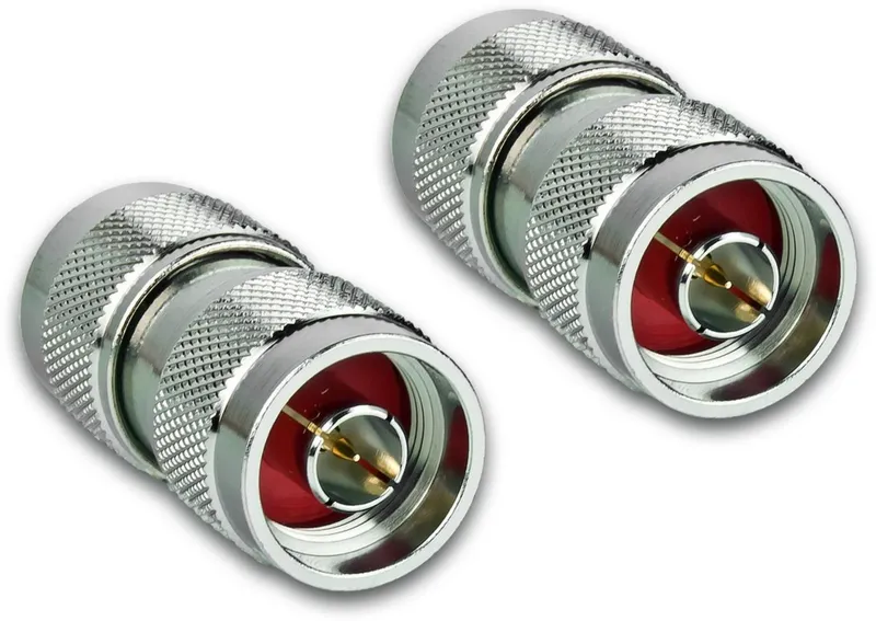 N-Stecker female-to-female adapter pair with knurled grips and red insulating rings shown on a clean white background for