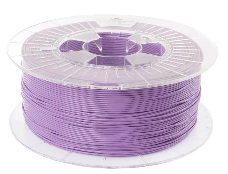 Bobina de filamento morado para impresora 3D en carretel de plástico transparente con etiqueta visible