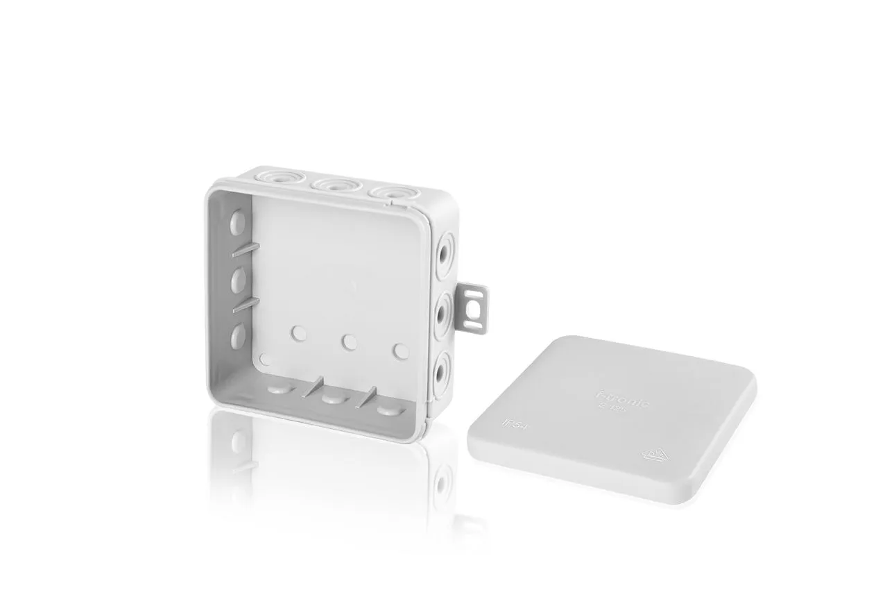 Scatola di derivazione elettrica F-tronic FR IP54 75x75x40mm grigia con coperchio staccato e montaggio a parete.