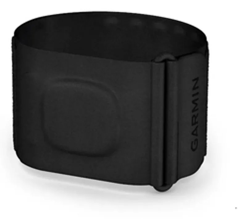 Garmin Index Sleep Monitor black fabric strap with sensor area and Garmin logo shown upright on white surface