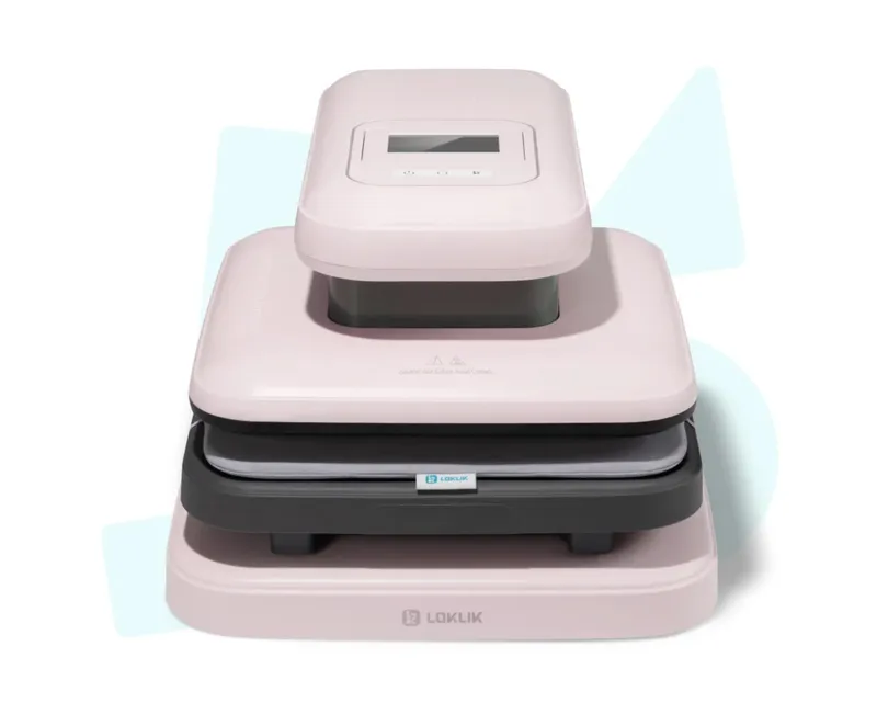 LOKLiK ImPress™ Auto 2 Smart in pastel pink, front view of heat press with control panel, heating plate, and branded base