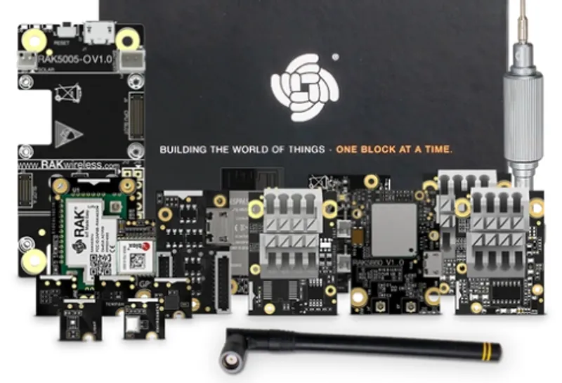 RAK Wireless WisBlock LoRa modular electronics kit with base board, connected circuit modules, antenna, and screwdriver for