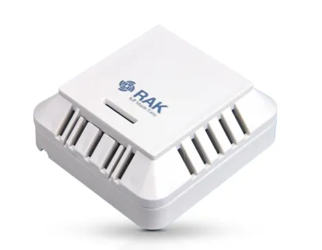 RAKBox-B3 indoor LoRa WisBlock enclosure with white square housing, blue RAK logo on top, and vertical ventilation grilles RAKBox-B3 indoor LoRa WisBlock enclosure with white square housing, blue RAK logo on top, and vertical ventilation grilles