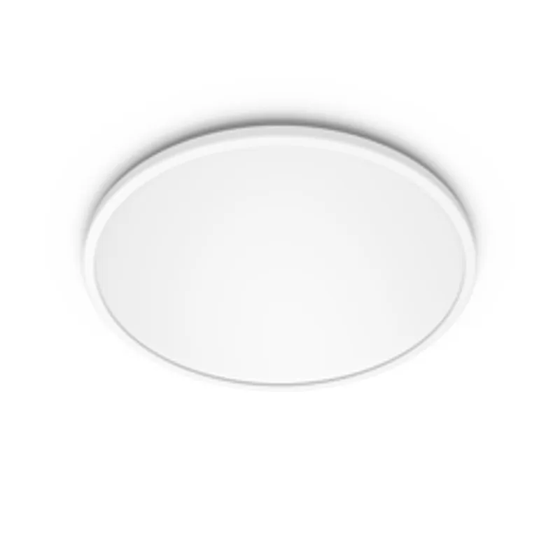 Plafonnier Philips Superslim CL550 blanc 18W à diffuseur plat circulaire vu de dessous en installation au plafond.