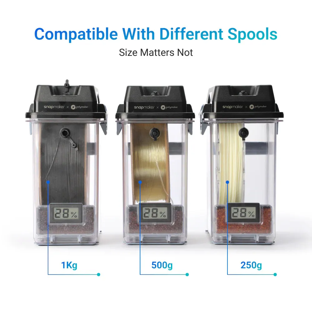 Drei Snapmaker SnapDryer mit schwarzen Deckeln und transparenten Kammern für 1Kg-, 500g- und 250g-Filamentspulen in