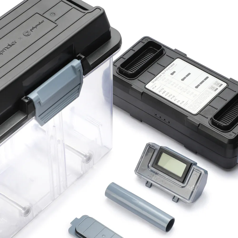Snapmaker SnapDryer von Polymaker mit Aufbewahrungsbox – zerlegte Komponenten: transparenter Behälter mit schwarzem Deckel,