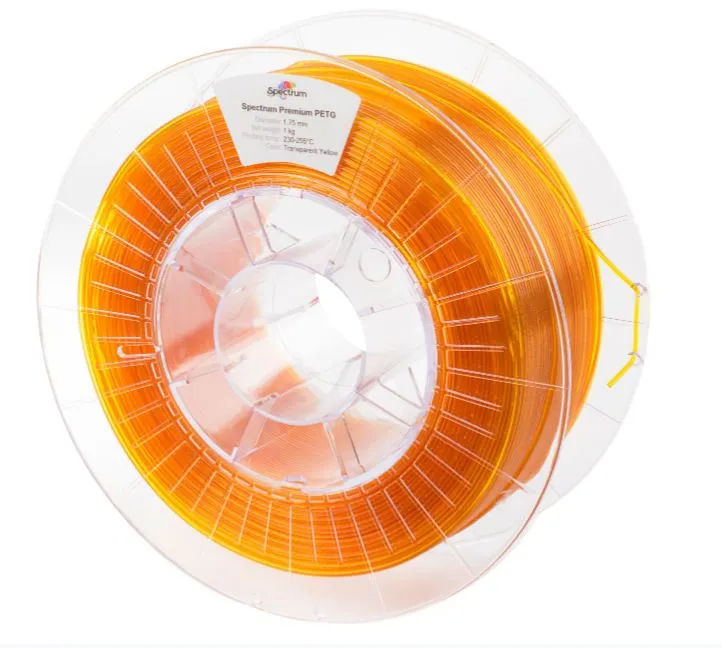Spectrum 3D Filament PET-G 1,75mm transparent yellow 1kg, clear plastic spool with translucent yellow filament viewed from Spectrum 3D Filament PET-G 1,75mm transparent yellow 1kg, clear plastic spool with translucent yellow filament viewed from
