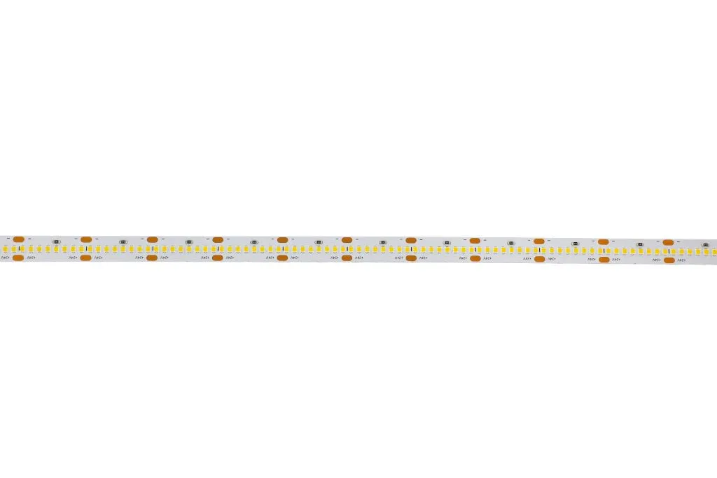 Synergy 21 LED Flex Strip 2022 with yellow LED chips and copper pads in a top-down view for DC24V 75W lighting applications. Synergy 21 LED Flex Strip 2022 with yellow LED chips and copper pads in a top-down view for DC24V 75W lighting applications.