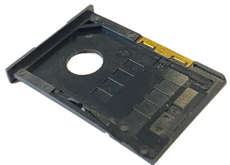 Teltonika SIM Card Holder for Routers, black plastic component with gold contacts and TELTONIKA branding shown from angled