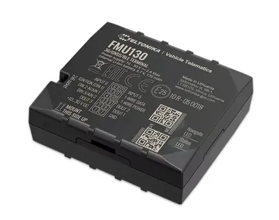 Teltonika FMU130 GPS-трекер для транспортных средств 3G/GSM/GNSS/BLE 4.0, вид сверху на черное устройство с белыми