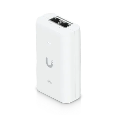 Ubiquiti PoE++ Injector 60W UACC-PoE++-10G with two RJ45 ports and PoE++ label on white device against black background. Ubiquiti PoE++ Injector 60W UACC-PoE++-10G with two RJ45 ports and PoE++ label on white device against black background.
