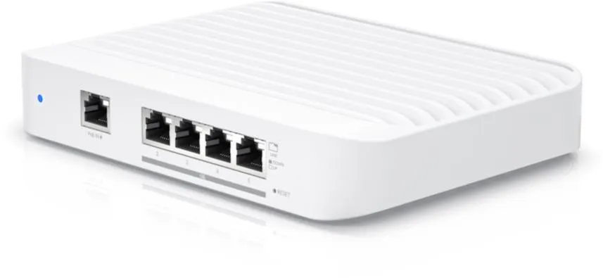 Commutateur Ubiquiti UniFi USW-Flex-XG 5 ports 10Gb avec entrée PoE, vue avant montrant ports RJ45, LED bleue et bouton Commutateur Ubiquiti UniFi USW-Flex-XG 5 ports 10Gb avec entrée PoE, vue avant montrant ports RJ45, LED bleue et bouton