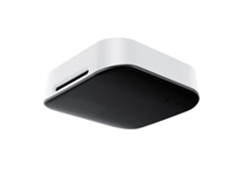 Capteur Yealink RoomSensor Pro vu de dessous avec boîtier blanc et face noire, fente latérale et point lumineux visible sur